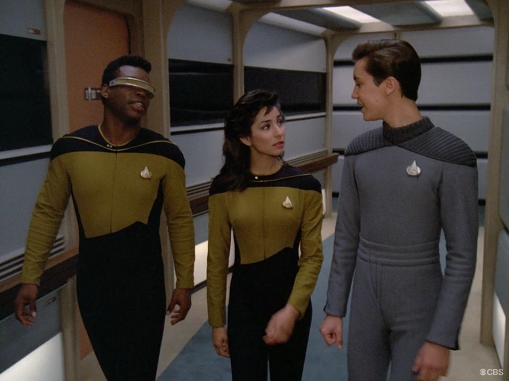 Geordie, Gomez, Wesley Crusher sharing a laugh in a corridor in Star Trek